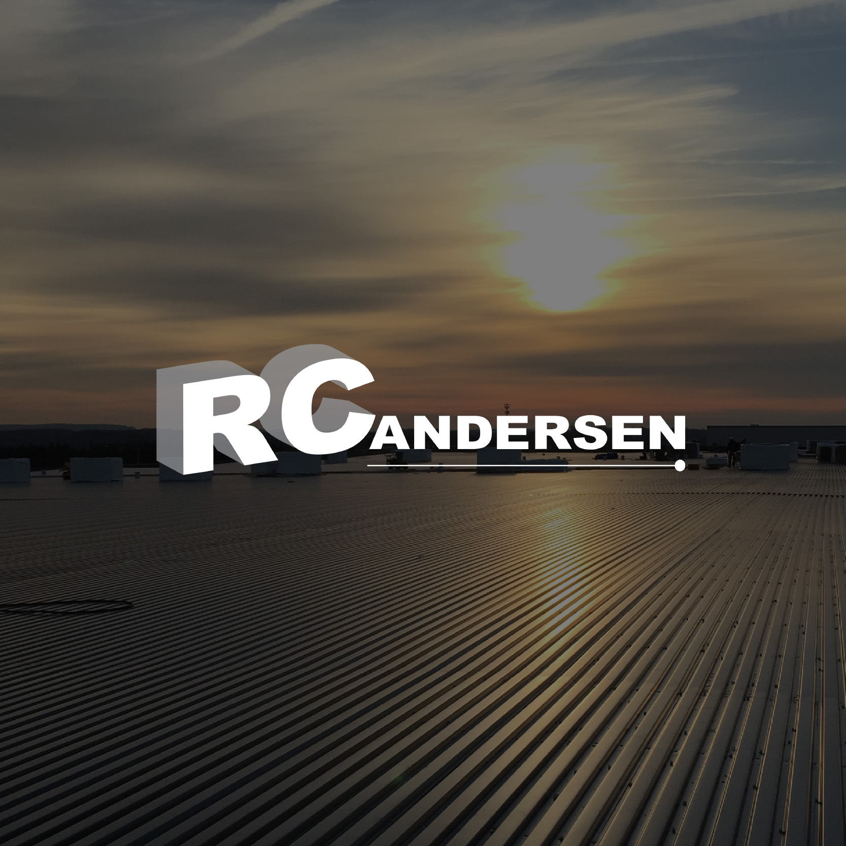 Image of sunrise on industrial facility rooftop