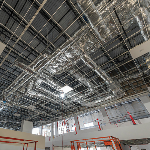 Exposed ceiling inside of an R&D facility's warehouse